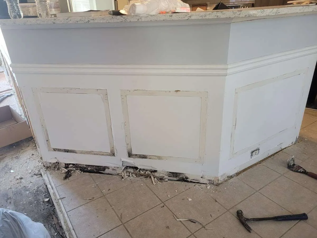 Water damage and mold on kitchen during Storm Damage Restoration in Springville